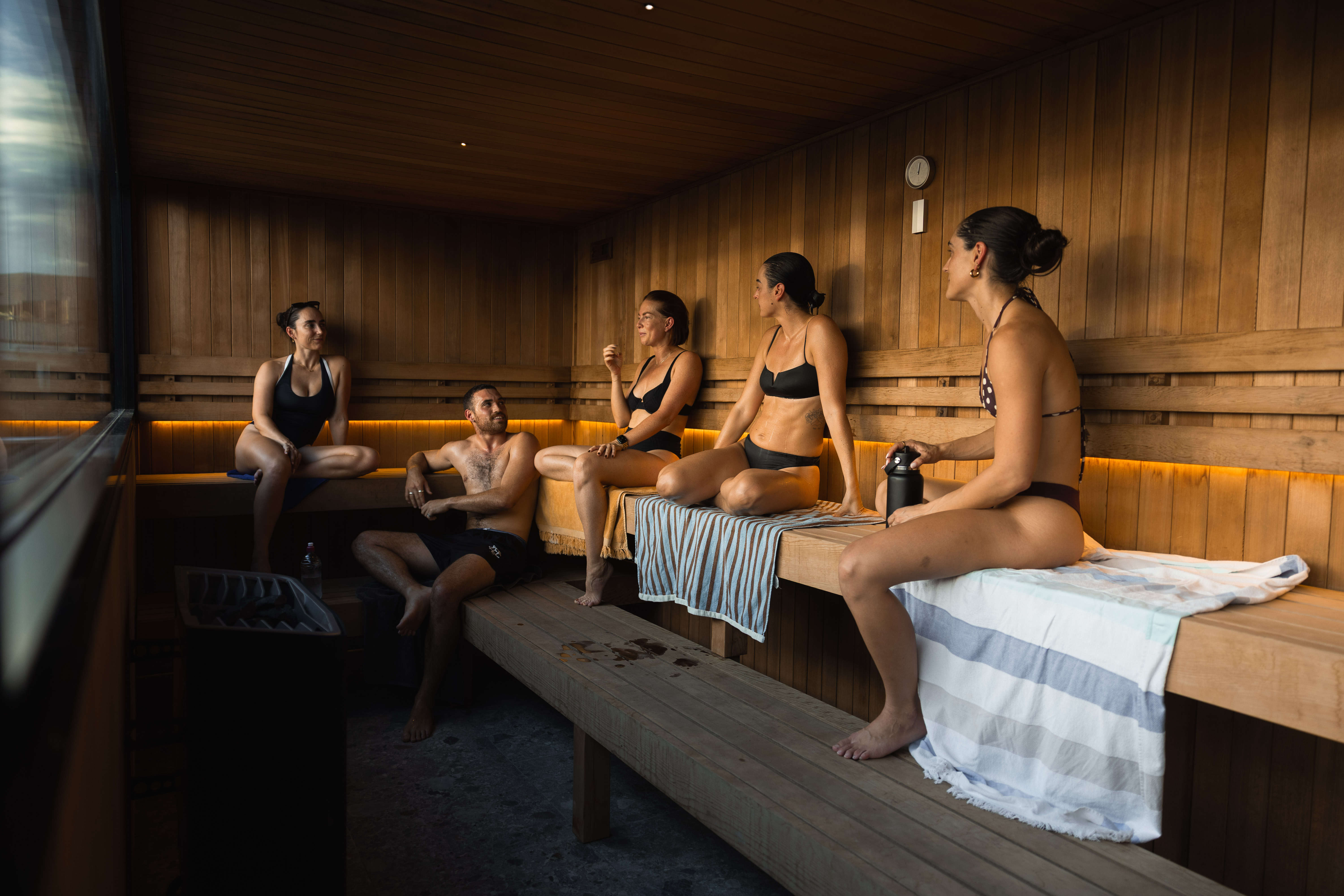 Warm sauna interior with soft amber light